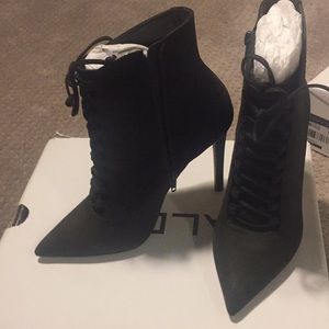 Olive green heeled lace up Aldo Booties